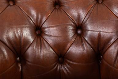 Coppia di poltrone chesterfield club inglese marrone con seduta capitonnè